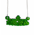 Sleep When You're Dead Green and Black Acrylic Necklace on white background